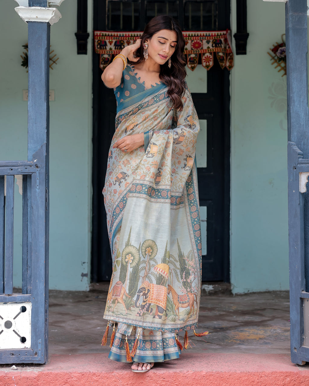 Icy Blue Handloom Cotton Saree with Peach Elephant Motifs & Royal Procession Pallu