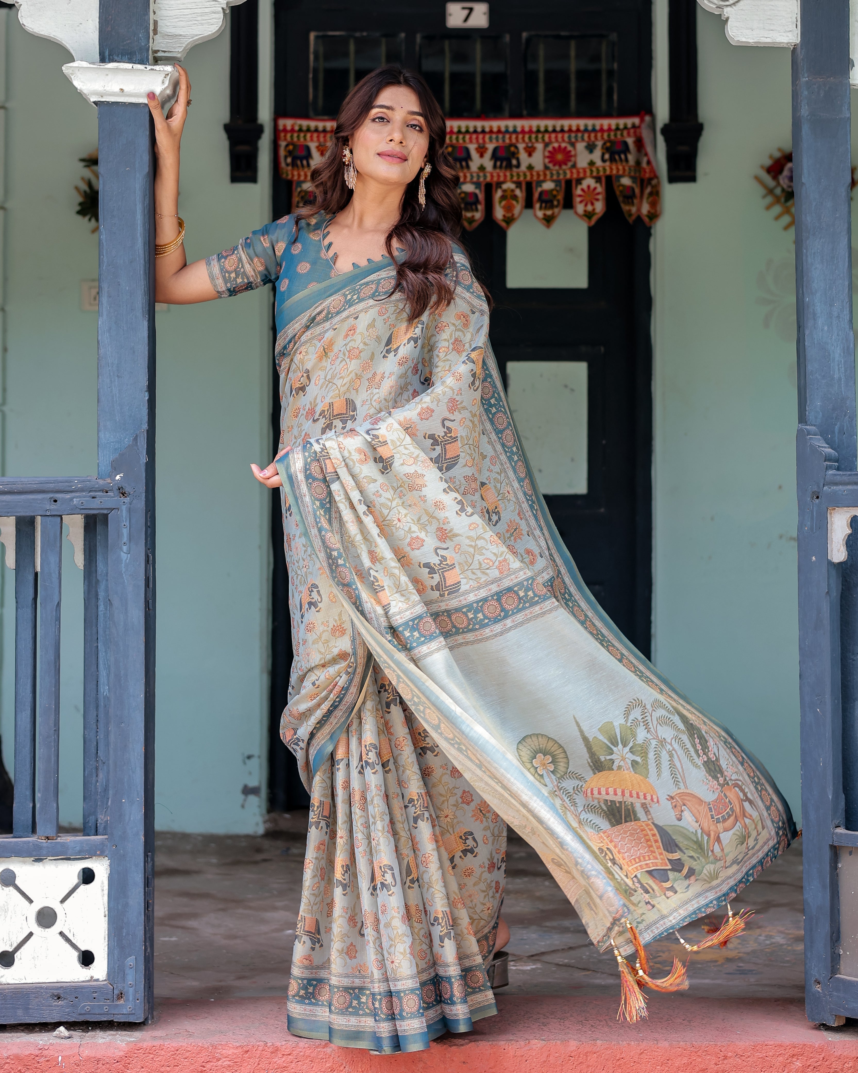 Icy Blue Handloom Cotton Saree with Peach Elephant Motifs & Royal Procession Pallu