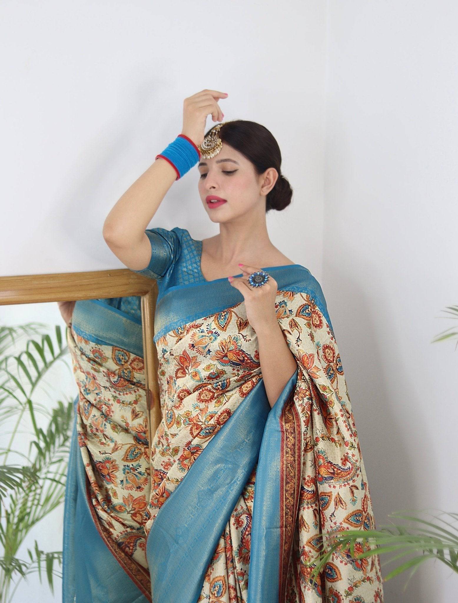 Digitally Printed Kuber Pattu Silk Saree, Exuding Regal Charm With Its Rich Pallu And Intricate Brocade Blouse, Elegantly Adorned With Enchanting Tassels On The Saree's Edge.
