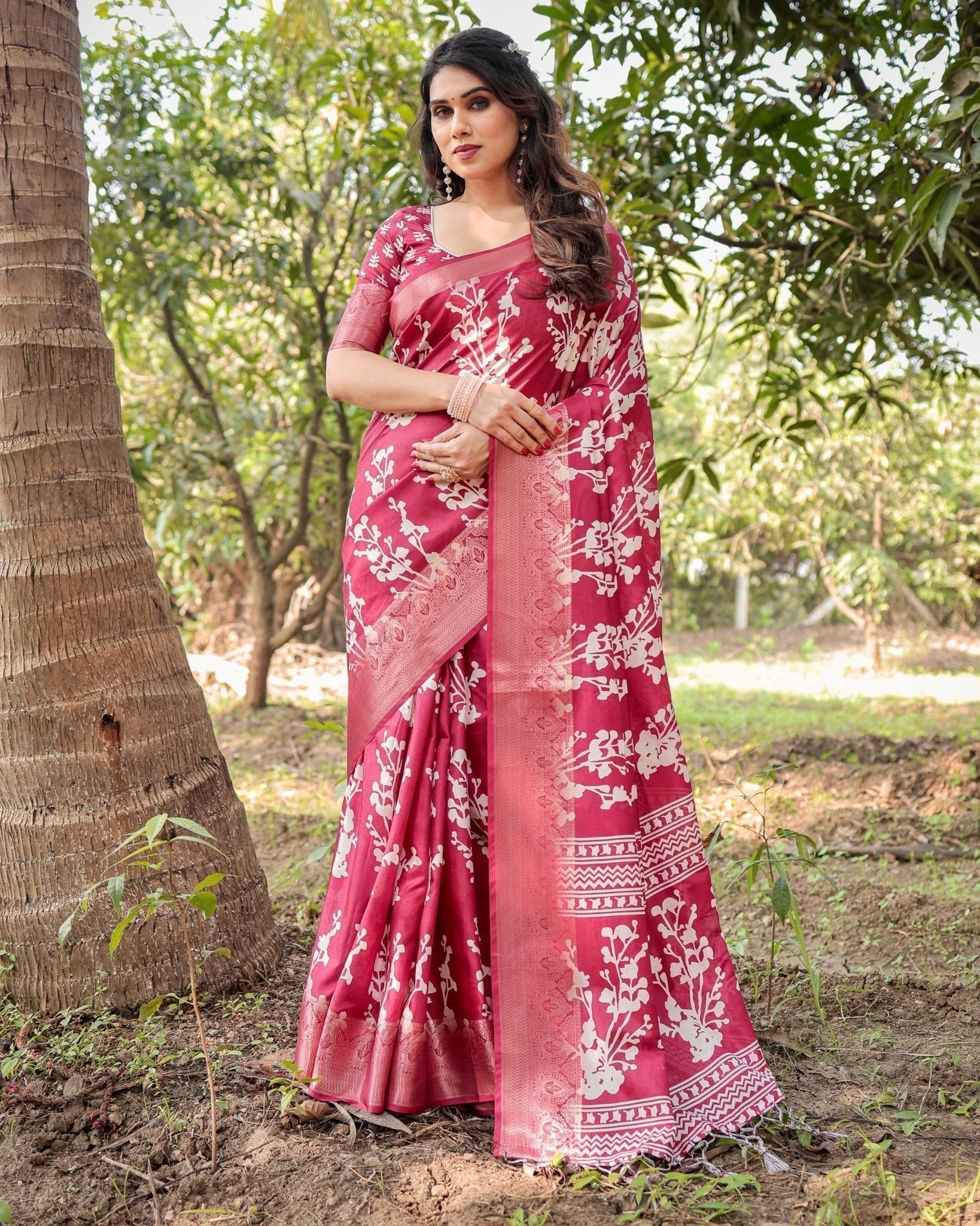 Maroon Tussar Silk Saree with White Floral Motifs, Intricate Zari Border, and Elegant Tassel Pallu