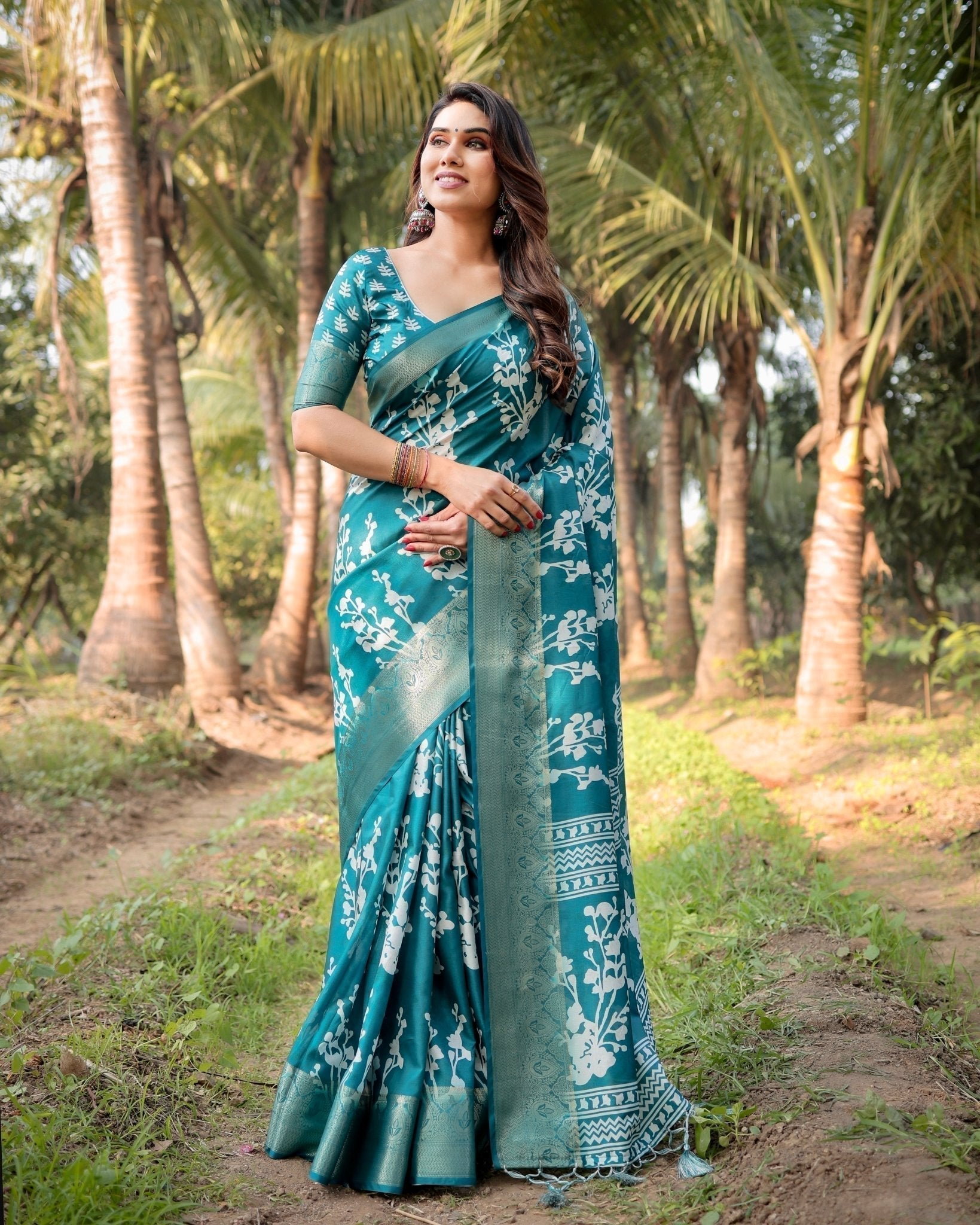 Teal Blue Tussar Silk Saree with White Floral Design, Gold Zari Border & Tassel Pallu