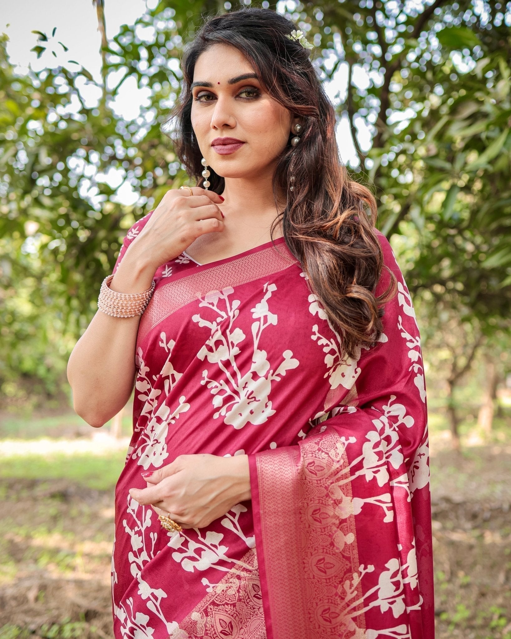 Maroon Tussar Silk Saree with White Floral Motifs, Intricate Zari Border, and Elegant Tassel Pallu